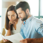 Examining documents together.